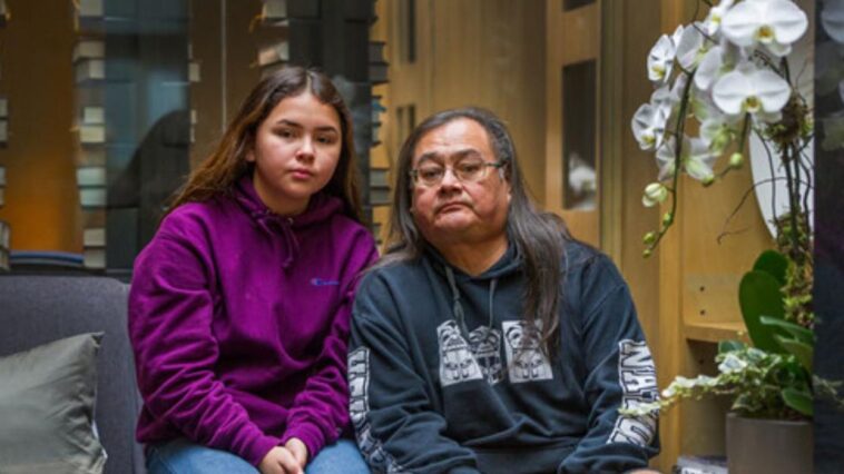 Maxwell Johnson and his granddaughter.