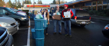 Janice Leffler and Doug Strand taking out a couple of Hampers.
