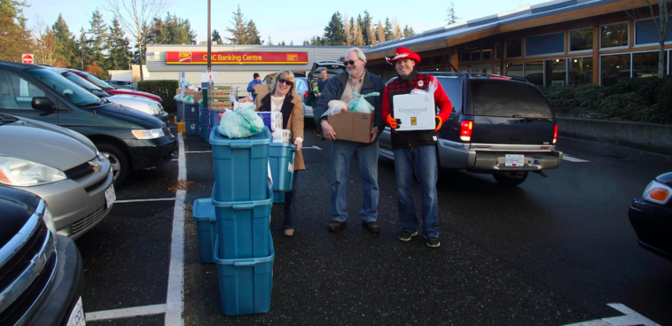 Janice Leffler and Doug Strand taking out a couple of Hampers.
